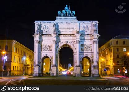 Victory Gate triumphal arch (Siegestor) in Munich, Germany at night