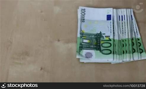 100 Euro banknotes increased in various shapes successively
