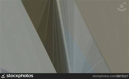 A computer-generated abstract background with moving lines and muted green and brown colors