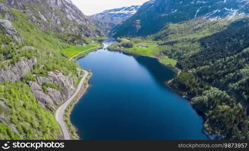 Aerial footage Beautiful Nature Norway. Flying over the lakes and fjords. View from the bird's-eye view. 4K ULTRA HD.