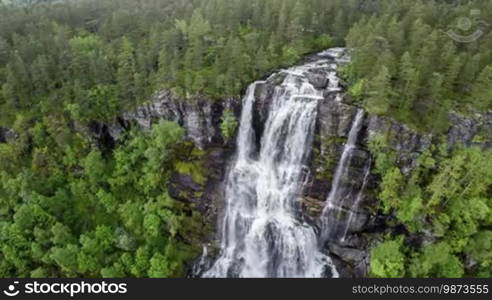 Aerial footage from Tvindefossen waterfall from the bird's-eye view, Norway