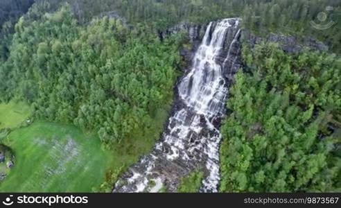 Aerial footage from Tvindefossen waterfall from the bird's-eye view, Norway