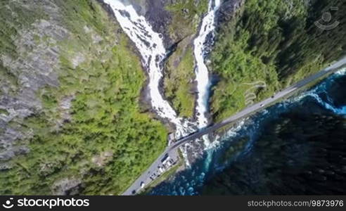 Aerial footage Latefossen Waterfall Odda Norway. Latefoss is a powerful, twin waterfall. View from the bird's-eye view.