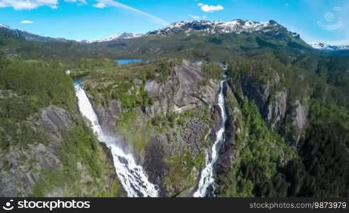 Aerial footage Latefossen Waterfall Odda Norway. Latefoss is a powerful, twin waterfall. View from the bird's-eye view.