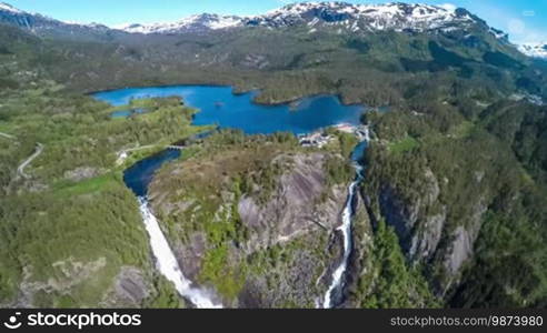 Aerial footage Latefossen Waterfall Odda Norway. Latefoss is a powerful, twin waterfall. View from the bird's-eye view.