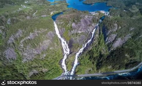 Aerial footage Latefossen Waterfall Odda Norway. Latefoss is a powerful, twin waterfall. View from the bird's-eye view.