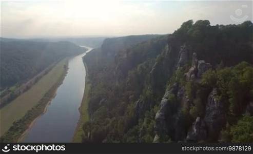 Aerial view of a magnificent panoramic of Bastai in Germany next to the river on a sunny day.