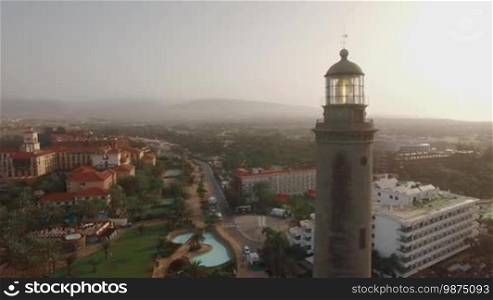 Aerial view of Maspalomas Lighthouse on the background of resort area and ocean, Gran Canaria