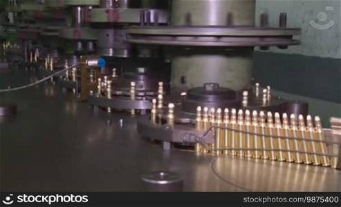 Ammunition factory, bullets for rifle on production line