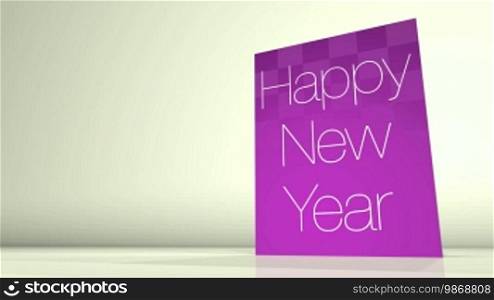 Animation of a greetings card showing a Happy New Year message.