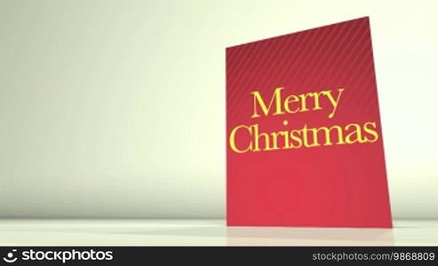 Animation of a greetings card showing a Merry Christmas message.