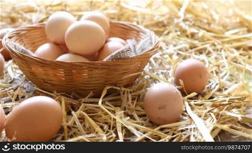 Basket of organic eggs in a rural farmers market - dolly shot 4K.