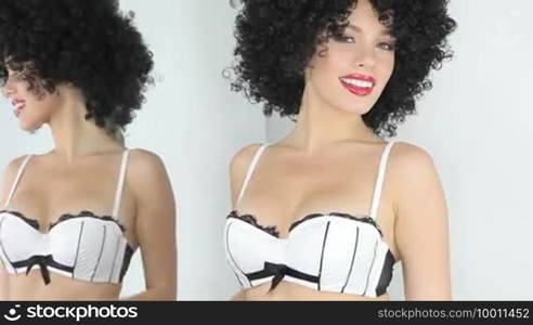 Beautiful woman in afro and lingerie
