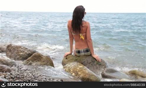 Beautiful woman in bikini at the beach