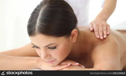 Beautiful young woman getting massage