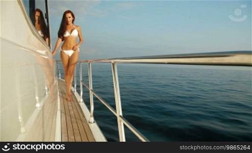 Bikini Woman Posing on Luxury Yacht