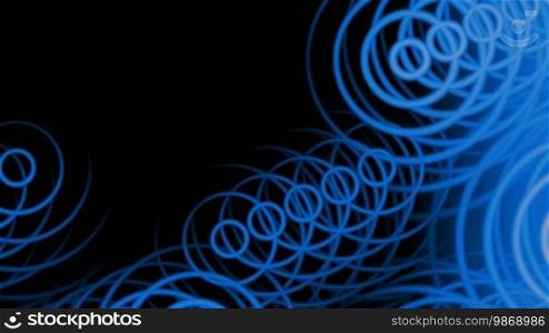 Blue rings float on a black background