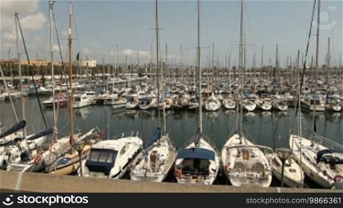 Boats are in the marina of Barcelona