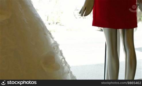 Bridal boutique display window with mannequins