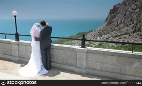 Bride and groom on the terrace in Foros, Crimea, Ukraine