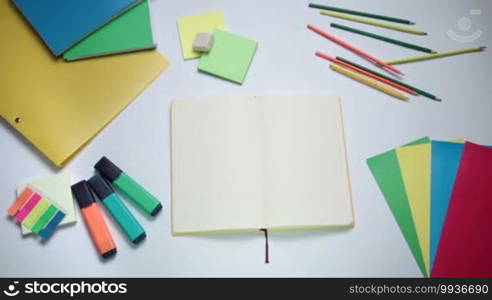 Bright idea concept appearing on white notepad on the table. Lightbulb, word Idea and light bulb idea sign