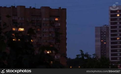 Buildings at night. Time lapse with panning.