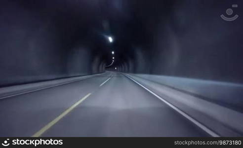 Car rides through the tunnel point-of-view driving