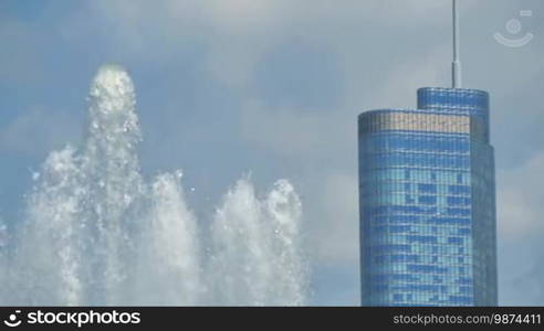 Chicago downtown skyscrapers behind the Buckingham Fountain waters. The Trump Tower is the skyscrapers in this shot. Awesome Chicago city center skyline in the United States of America.