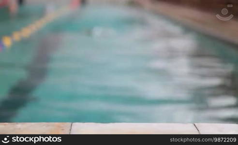 Child competing in a swimming race