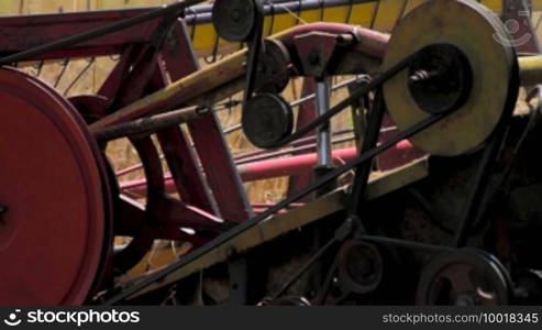 Close up on combine harvesting rye