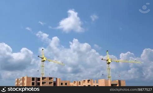Complete construction time-lapse from start to finish on background of cloudy sky, wide angle, 1080p