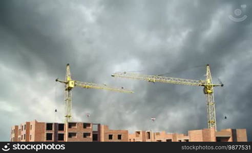 Complete construction time-lapse from start to finish on background of thunderclouds, 1080p