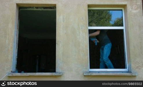 Contractor installing new double glazed windows