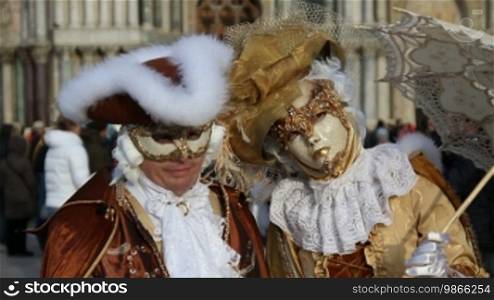 Couple with Rococo masks