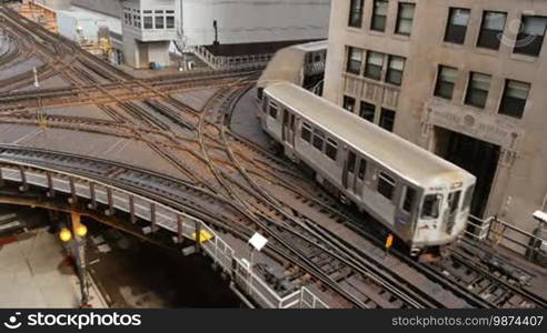 Cta trains running on elevated tracks of Metro Chicago. Commuters traveling by train to their offices in the financial district of Illinois in the United States of America. Subway crossing the exchanger train tracks area running through the center of the city in the downtown district.
Formatted:
CTA trains running on elevated tracks in Metro Chicago. Commuters traveling by train to their offices in the financial district of Illinois in the United States of America. Subway crossing the exchange train tracks area running through the center of the city in the downtown district.