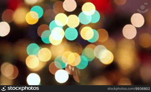 Defocused Christmas lights background.