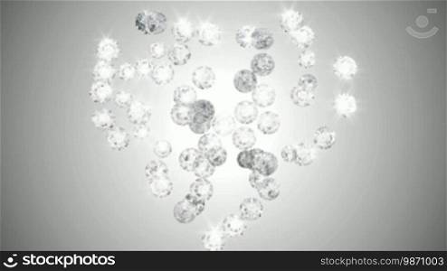 Diamonds heart shape assembling and exploding with slow motion