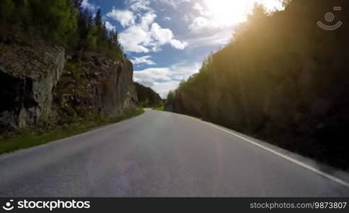 Driving a Car on a Road in Norway