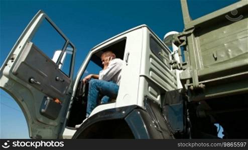 Dump Truck Driver On The Phone