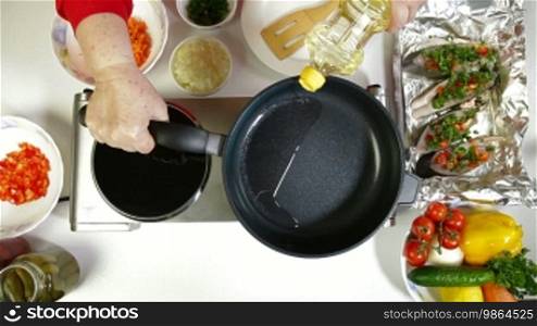 Female Pouring Cooking Oil On Frying Pan