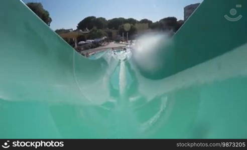 First-person view, the descent from the waterslide on holiday aqua park
