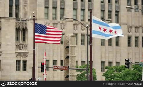 Flagstaff on the Golden Mile in Chicago city center. American flags waving in the Windy City of Chicago.