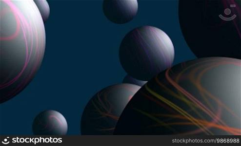 Full spheres slowly fly upwards and rotate