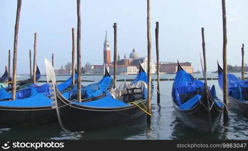 Gondolas lying in the water