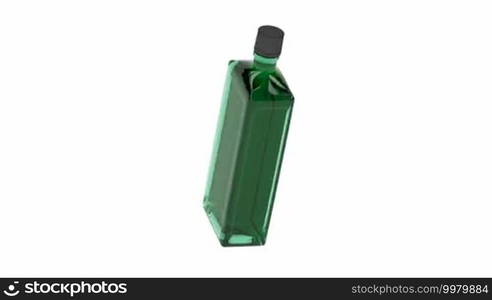 Green alcohol bottle spin on white background