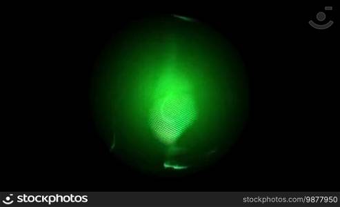 Green glowing orb on black background