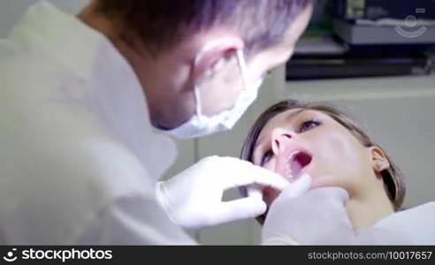 Healthcare worker and client in medical clinic, dentist during visit to inspect mouth and dental hygiene of young female patient. Sequence of medium shot and closeup of tools