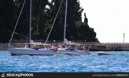 Lagoon in Croatia, small boats passing