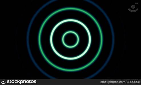 Light circles disperse and die away against a dark background