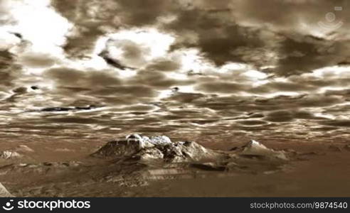 Low dense clouds fly over a deserted mountain landscape. The tops are covered with snow. In the lowlands a thick brown mist. Landscape lit by a bright light.